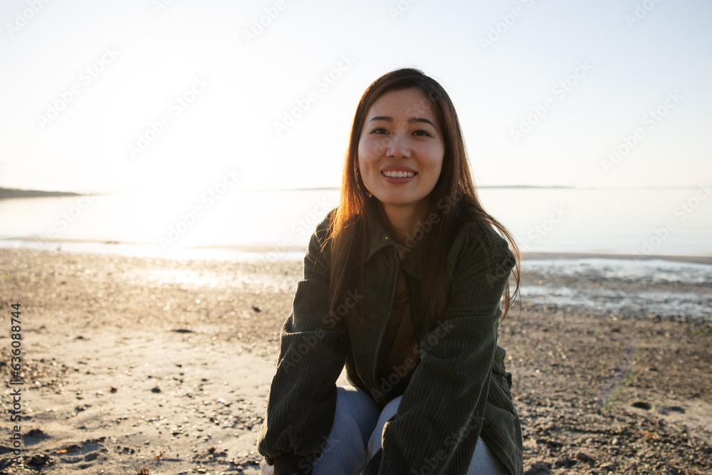 Woman outside enjoying nature and smiling at the camera. Woman outside enjoying nature and smiling at the camera.
