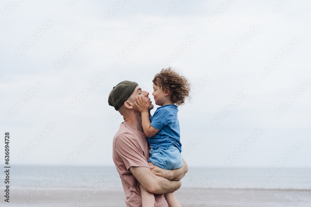 Young father and son on the beach Young father and son on the beach