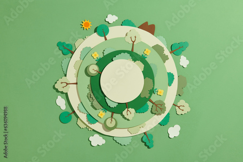 Paper cut of Green city concept on green photo