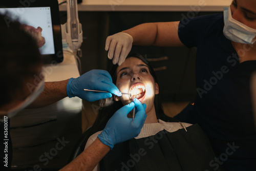 Dental clinic patient with open mouth photo