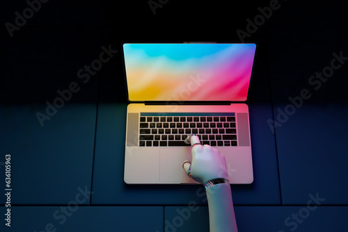 Robot hand pressing laptop key photo
