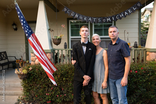 Parents with their highschool graduate 