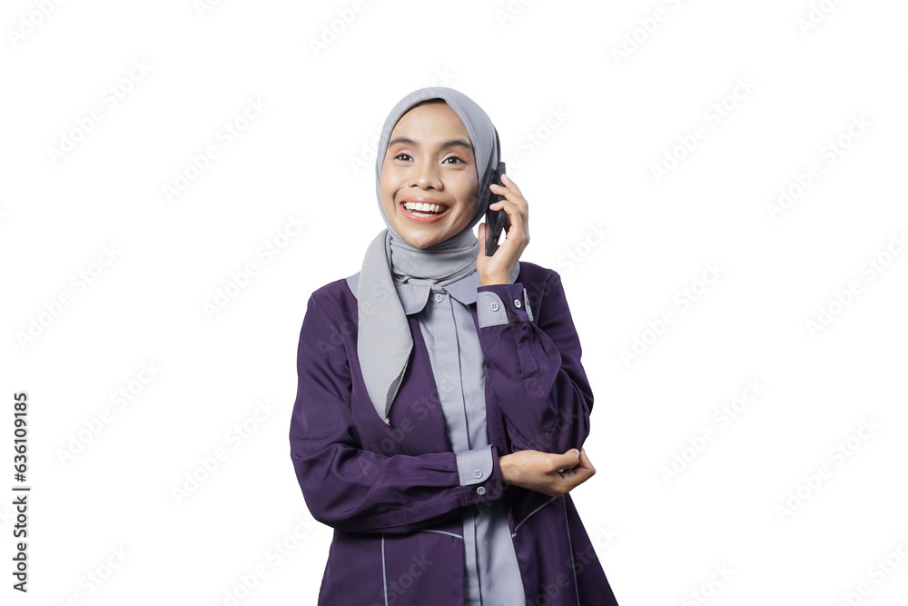 Overjoyed beautiful Asian woman in casual shirt talking on mobile phone and looking at camera isolated over white background Overjoyed beautiful Asian woman in casual shirt talking on mobile phone and looking at camera isolated over white background