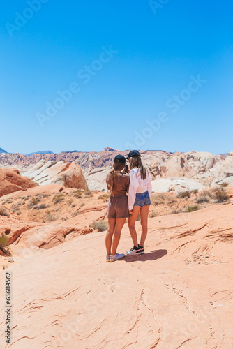 Young girls on trail at Fire Valley in Utah © travnikovstudio