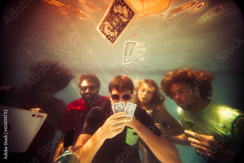 Underwater poker gambling in swimming pool