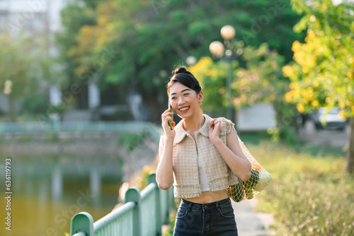 Portrait happy smiling woman talking on mobile cell phone