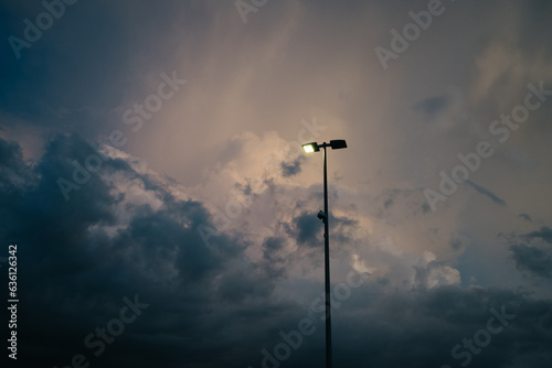 LED Light Post against clouds photo