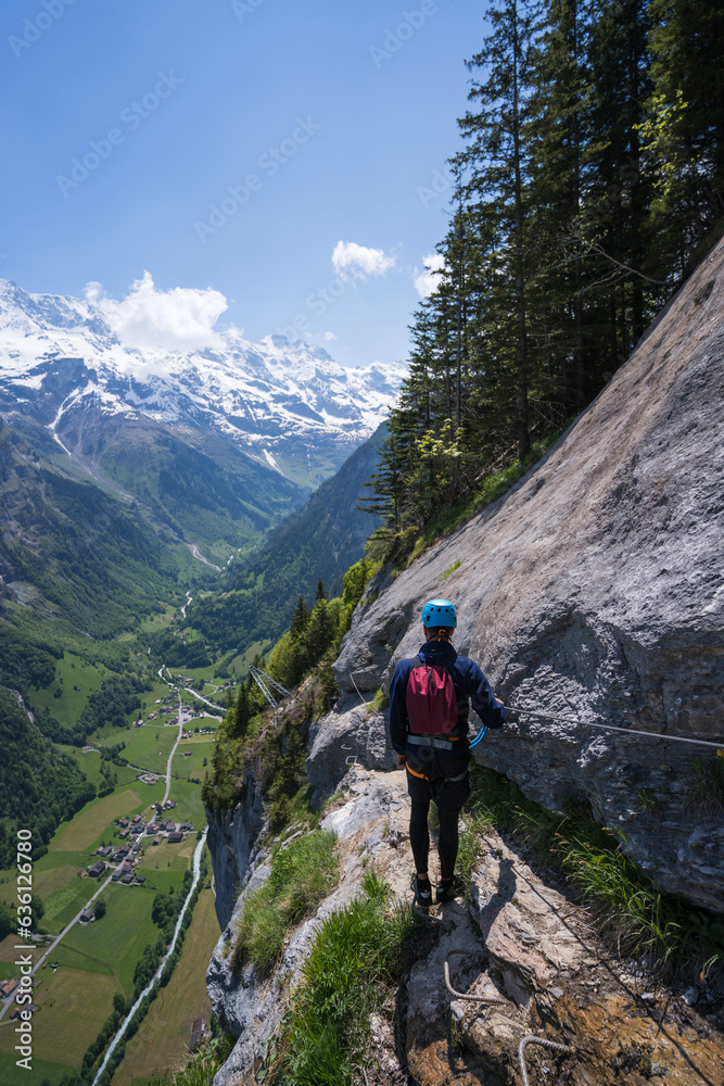 Anonymous Man On Via Ferrata With Scenic View Anonymous Man On Via Ferrata With Scenic View