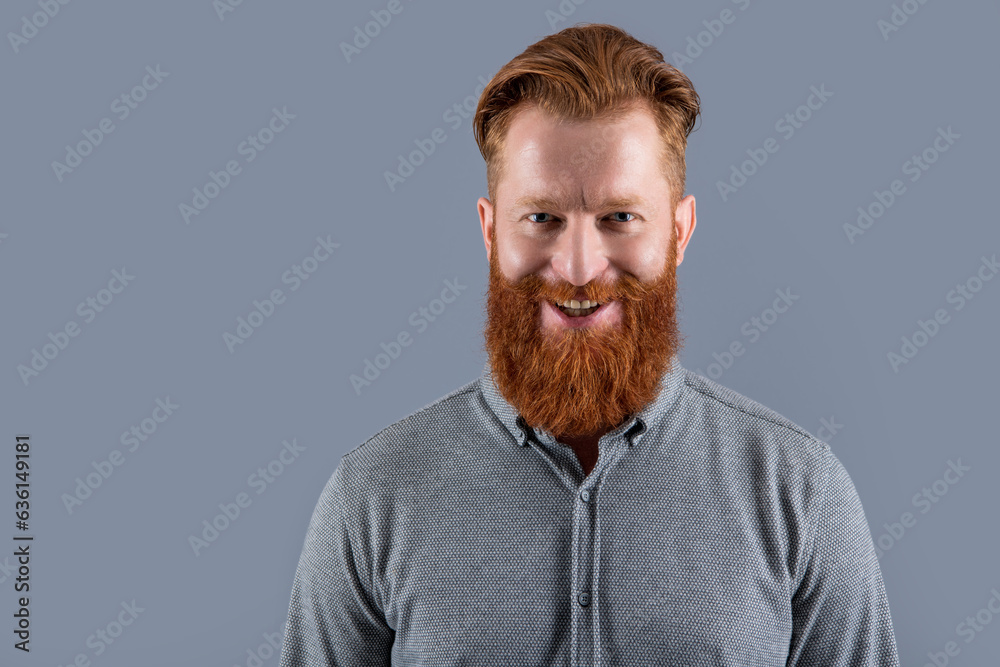 cheerful bearded man has beard. bearded man with long beard isolated on grey background