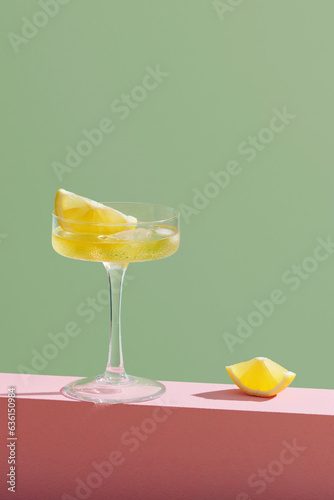 Glass of tasty martini cocktail on table