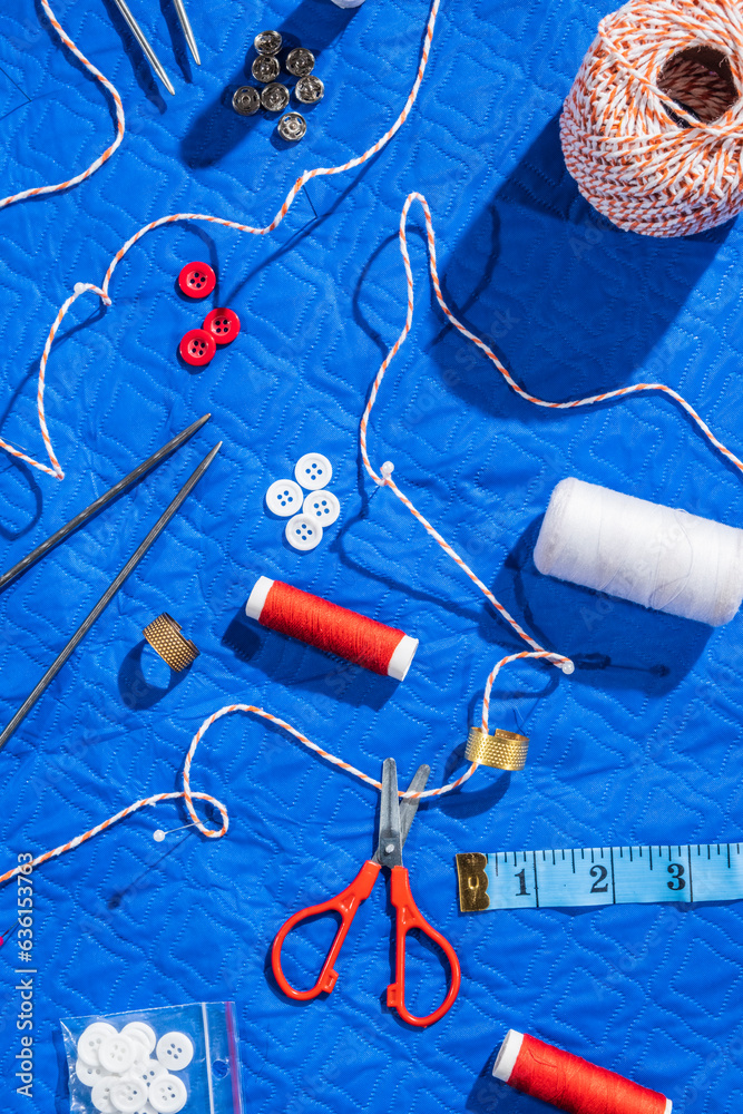 Sewing supplies on tailor desk . Sewing supplies on tailor desk .