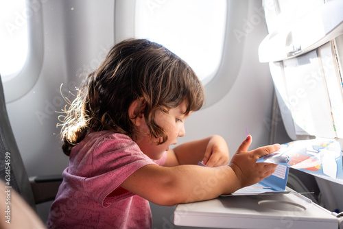 Kid traveling on the plane
