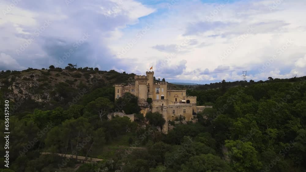 Aerial pedestal rises above picturesque Chateau Comtal, Provence France Aerial pedestal rises above picturesque Chateau Comtal, Provence France