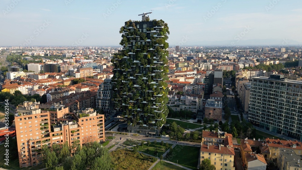 Europe, Italy,Milan 08-18-2023 - drone aerial view of Vertical Forest ( bosco verticale ) luxury skyscraper ecological and sustainable with trees and greenery on the facades in Gae Aulenti new skyline