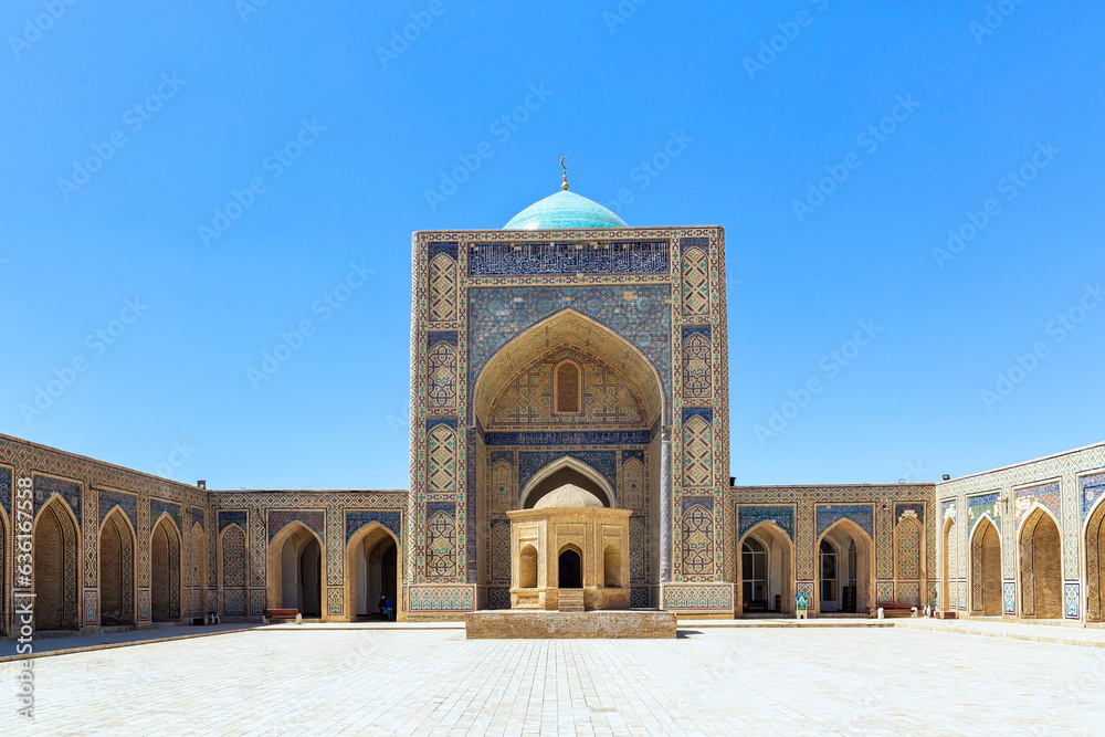 Kalon mosque designed with traditional tile ornaments and text from Q'ran (verses from Koran holy book in arabic language). Bukhara, a UNESCO World Heritage Site. Uzbekistan