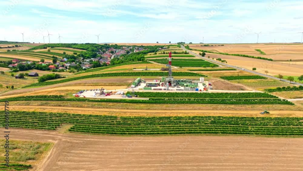 Onshore Drilling Rig For Oil And Gas In Austria - aerial drone shot Onshore Drilling Rig For Oil And Gas In Austria - aerial drone shot