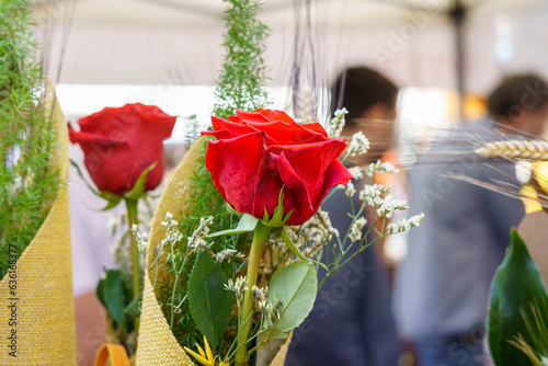 Red rose with an ear of wheat, Sant Jordi celebration on April 23rd in Catalonia, Spain. photo