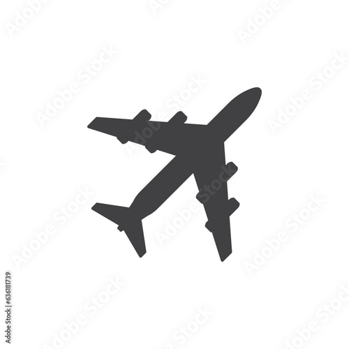 Silhouette of an airplane flying in the sky