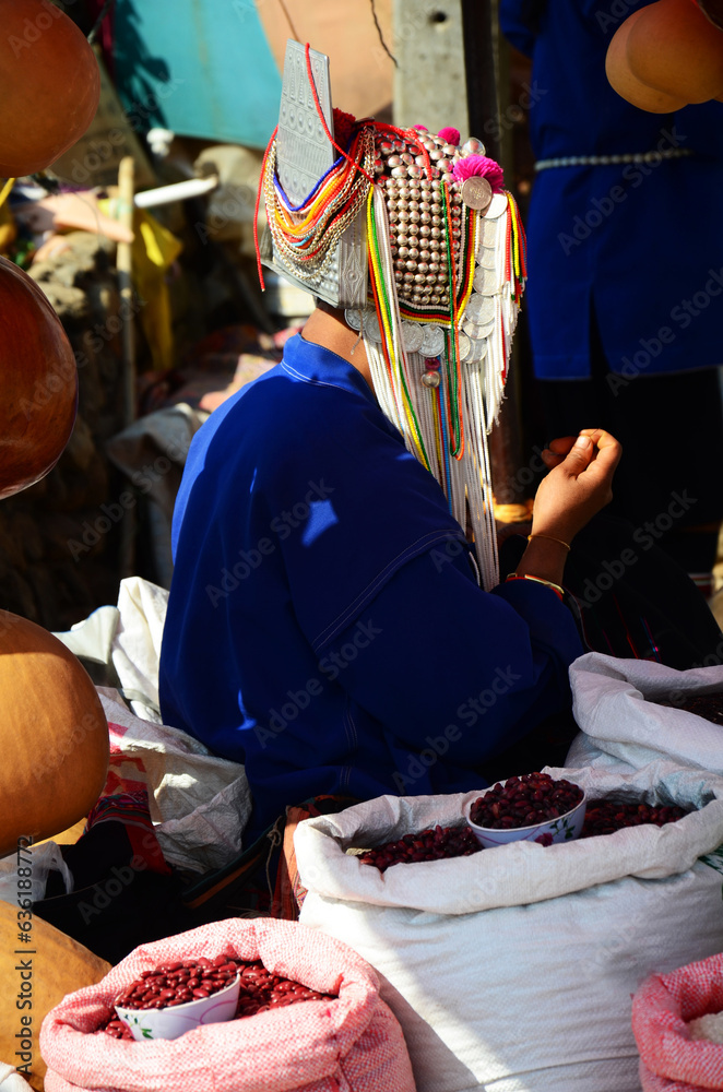 Akha tribe and hmong tribal or karen ethnic selling product indigenous and wisdom goods in local stall hawker shop street bazaar market of Doi Mae Salong hill at Mae Fah Luang in Chiang Rai, Thailand