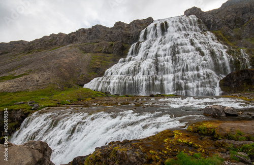 Dynjandi waterfall Iceland with dramatic foreground