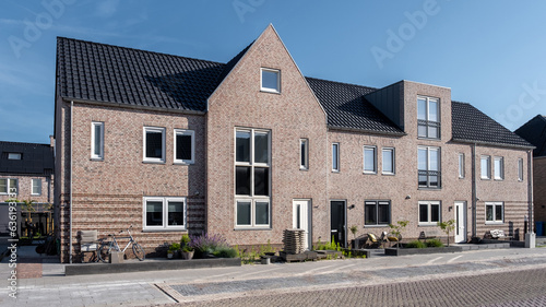 Fototapeta Naklejka Na Ścianę i Meble -  Dutch Suburban area with modern family houses, newly build modern family homes in the Netherlands