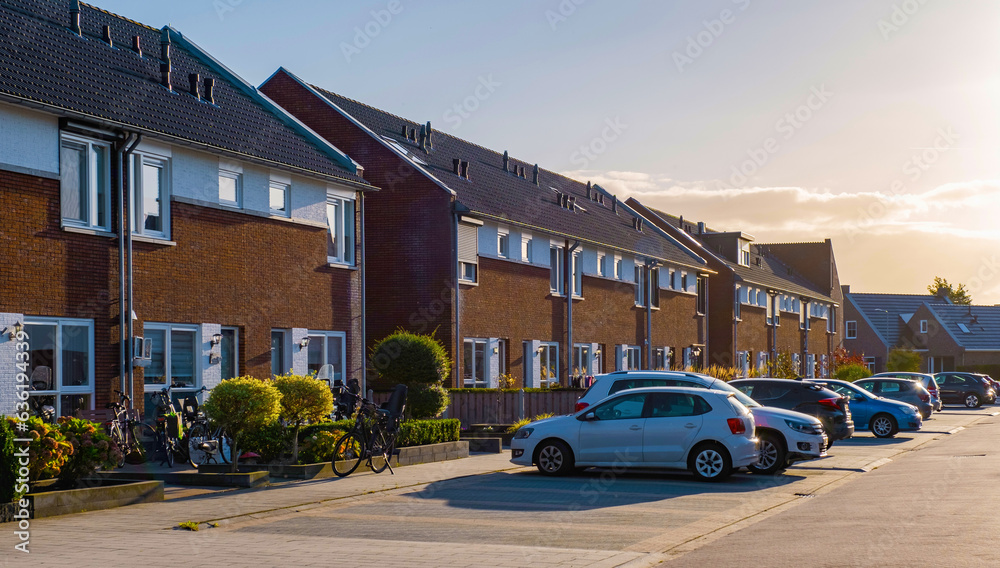 Dutch Suburban area with modern family houses, newly build modern family homes in the Netherlands, dutch family house in the Netherlands, row of newly build houses in the Netherlands