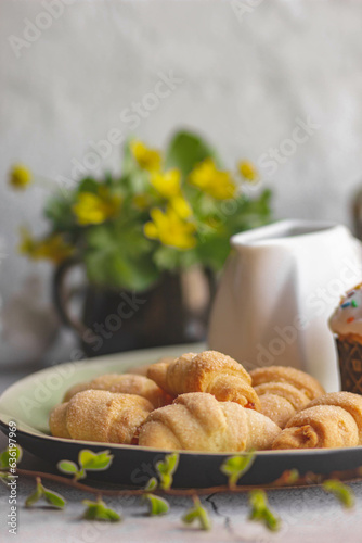 Sweet homemade cakes in close-up, mini bagels on a platter