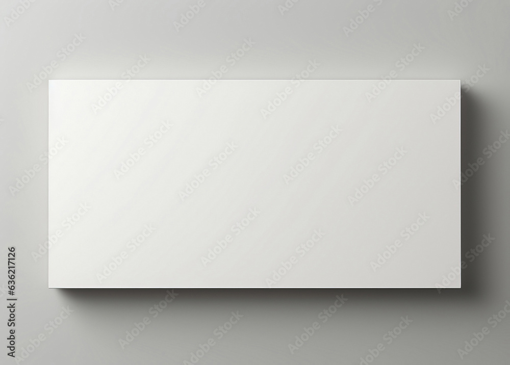 white sheet of paper on an grey wall white sheet of paper on an grey wall