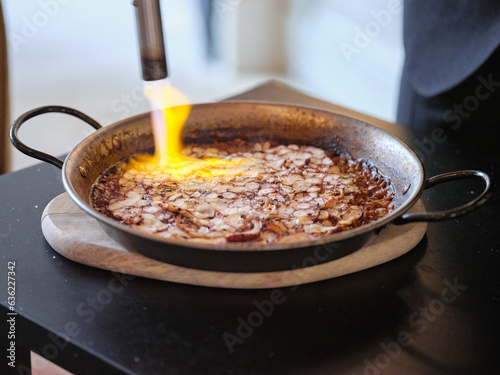 Pan with traditional paella and burner