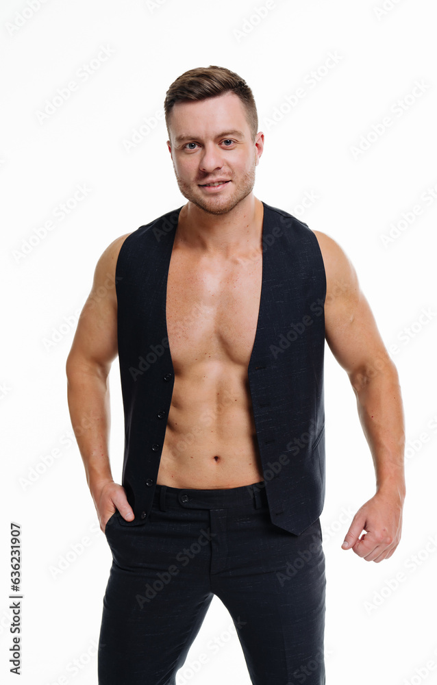 A shirtless man posing for a picture A shirtless man posing for a picture