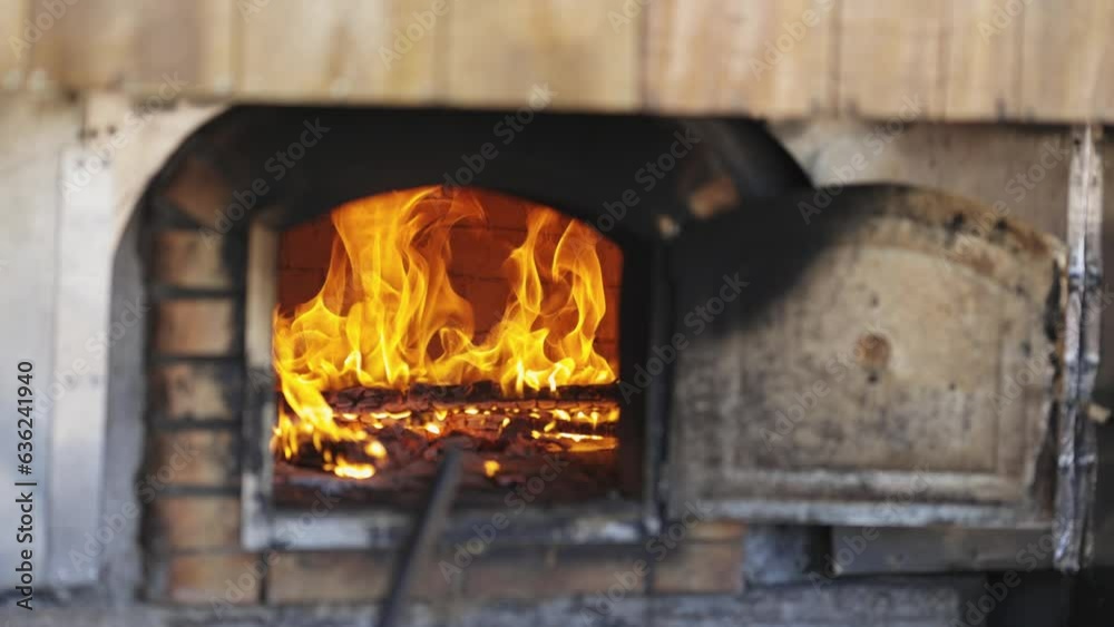 Burning Fire In The Fireplace - outdoors Burning Fire In The Fireplace - outdoors