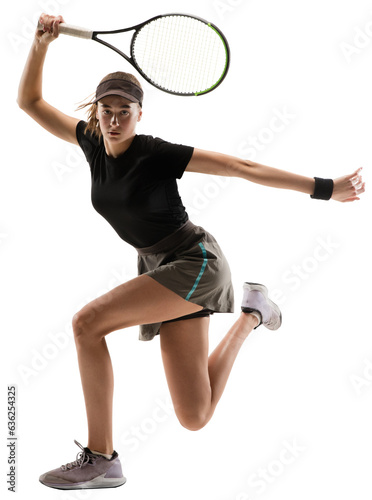 Concentrated young sportive girl, tennis player in motion hitting ball with racket isolated over transparent background. Concept of professional sport, competition, game, action, hobby. © master1305