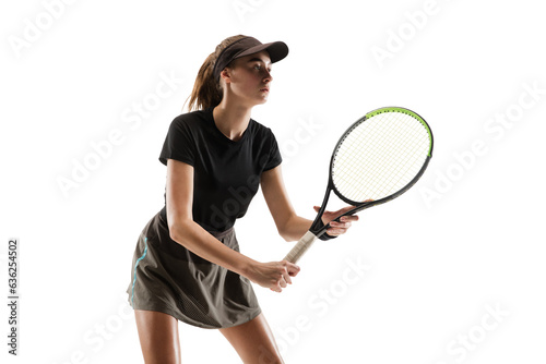 Sportive girl, tennis player in sportswear standing in position with racket during game isolated over transparent background. Concept of professional sport, competition, game, action, hobby.