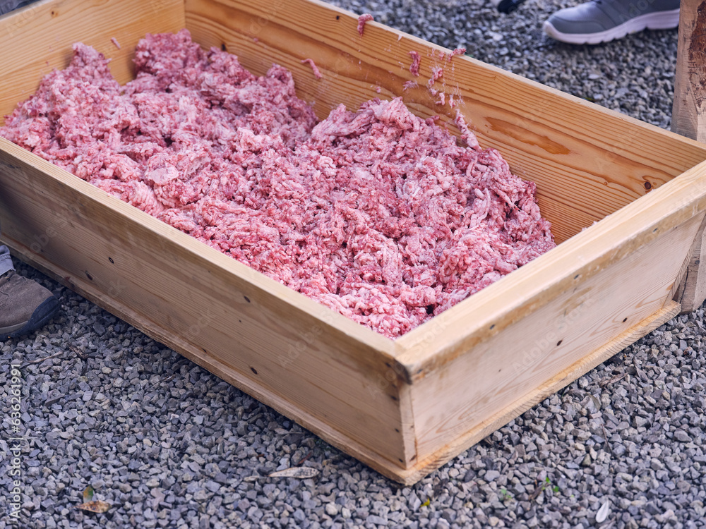 Wooden box with beef minced meat