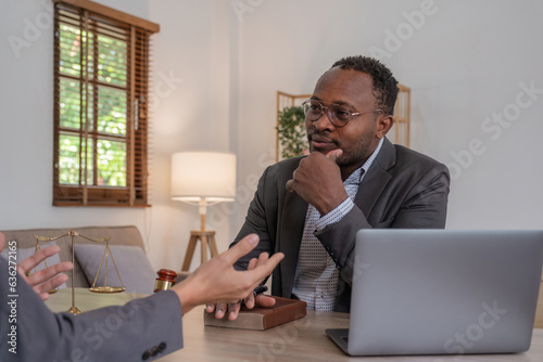 American African Lawyers advice discussion to client about agreement contract. Law, Advice, Justice concept