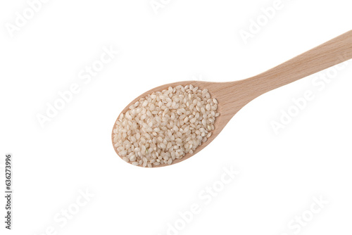 Foto Bomba rice in wooden spoon on white background, top view
