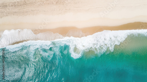 Overhead photo of crashing waves on the shoreline beach. Tropical beach surf. Abstract aerial ocean view