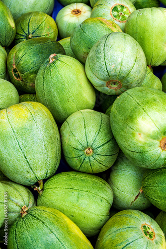 Photography fresh green melons close up for sale at a street market shot on toronto's spadin