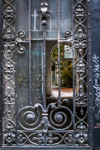 View through an ornate house gate into the courtyard, Zagreb, Croatia