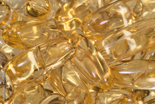 Capsules with fish oil background