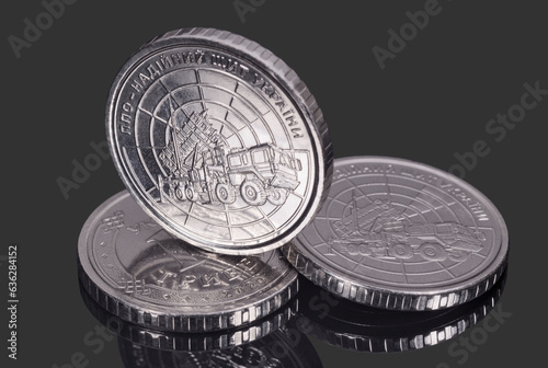 Ten Ukrainian hryvnias coins with the image of the surface-to-air missile (SAM) system Patriot