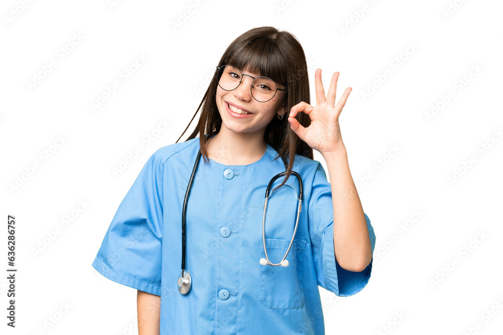 Little girl as a surgeon doctor over isolated chroma key background showing ok sign with fingers Little girl as a surgeon doctor over isolated chroma key background showing ok sign with fingers