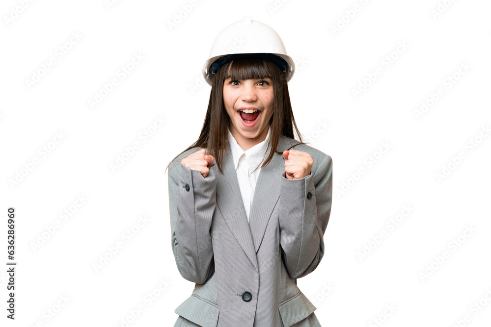 Little girl playing as a architect with helmet and holding blueprints over isolated background celebrating a victory in winner position Little girl playing as a architect with helmet and holding blueprints over isolated background celebrating a victory in winner position