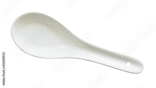 top view of white ceramic soup spoon cutout on white background photo