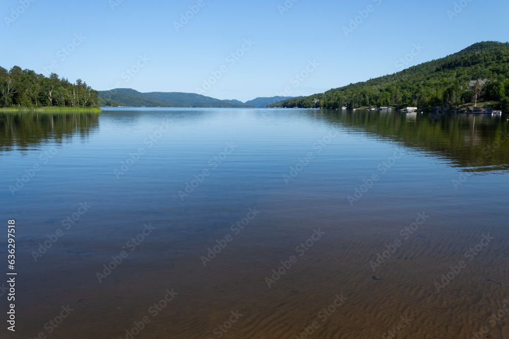 Lac Tremblant - panoramic view of a lake and background mountains, peaceful view