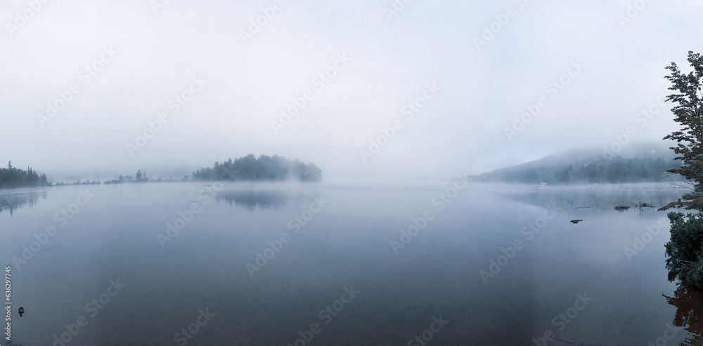 Fototapeta premium Mist - Lac Tremblant emerges from the early morning mist