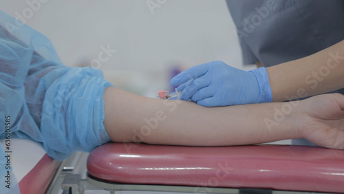 Patient in a hospital receiving an intramuscular injection.