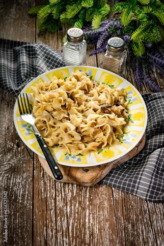 Pasta with sauerkraut and sausage. photo