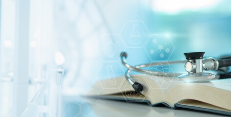 medical education learning concept. stethoscope on medical textbook for doctor learning treatment and Procedures.