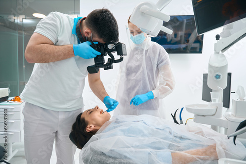 Young lady at a reception in a dental office